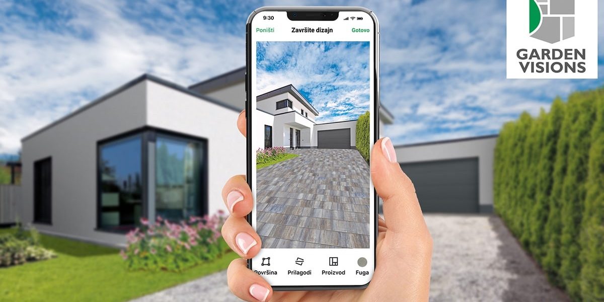 Roka, ki drži mobilni telefon, na katerem je prikazana aplikacija Garden Vision
