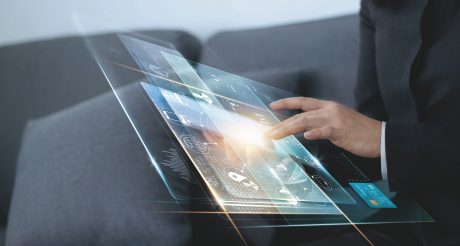 Woman touching digital tablet